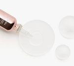 PURCELL 82% High Dose Peptide Formula 20ml Serum with droplets on a transparent dish.